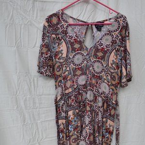 Colorful shorts romper with floor-length duster.